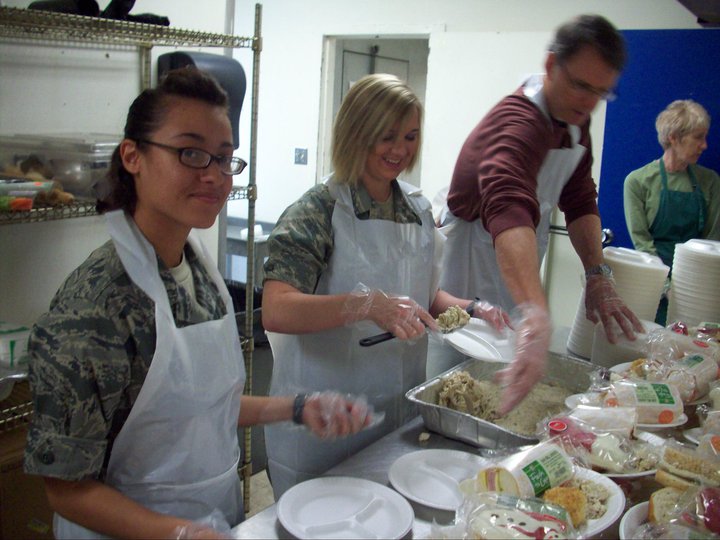 Christian service as a community, working in a feeding program