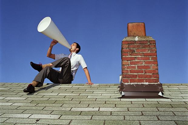 standing on the rooftop shout it out